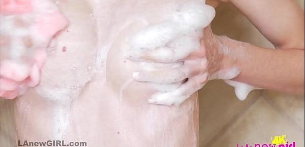  Cute 18 blonde babe showers her teenie body in 4K